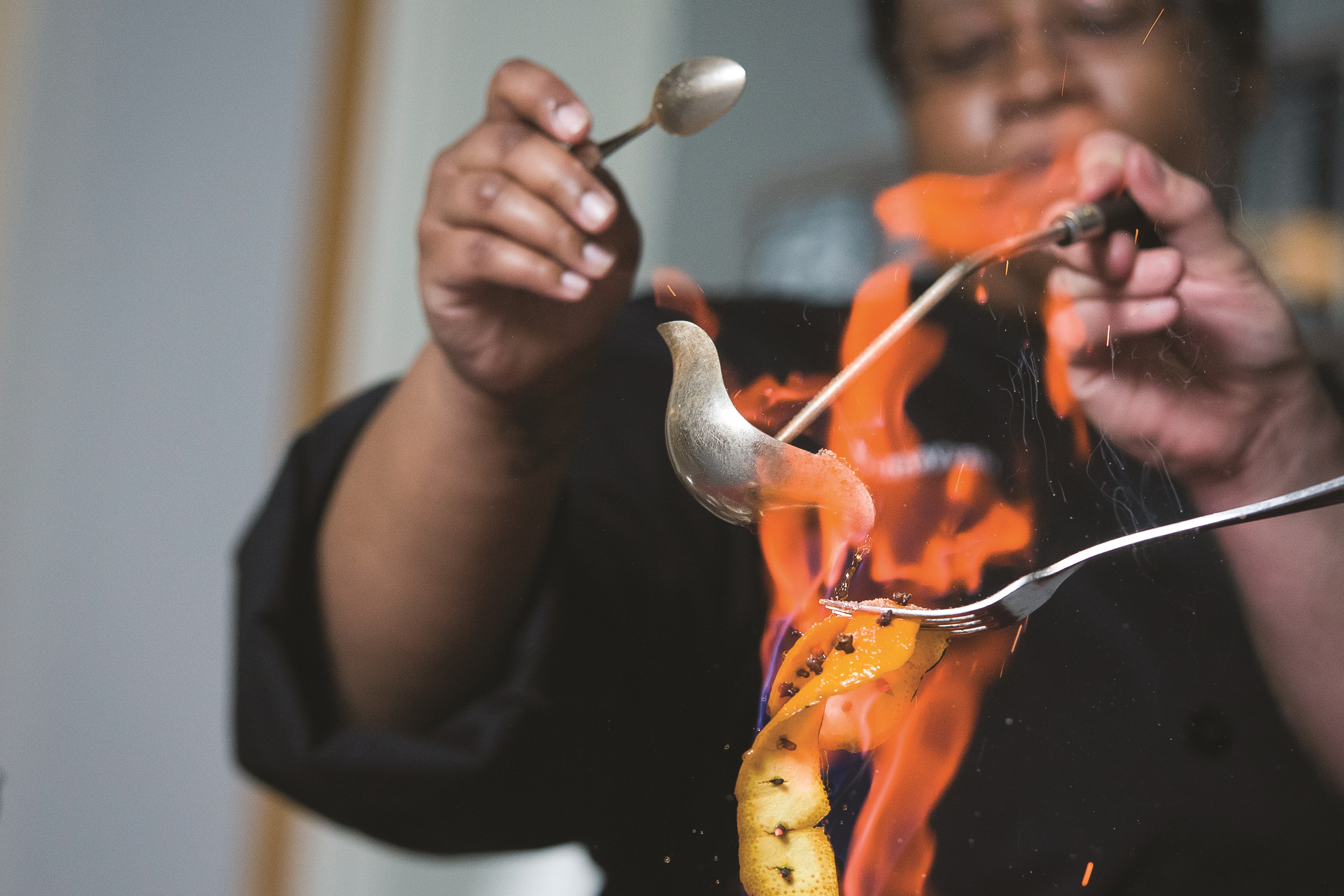 GRCC Culinary Students in the Heritage preparing a dessert