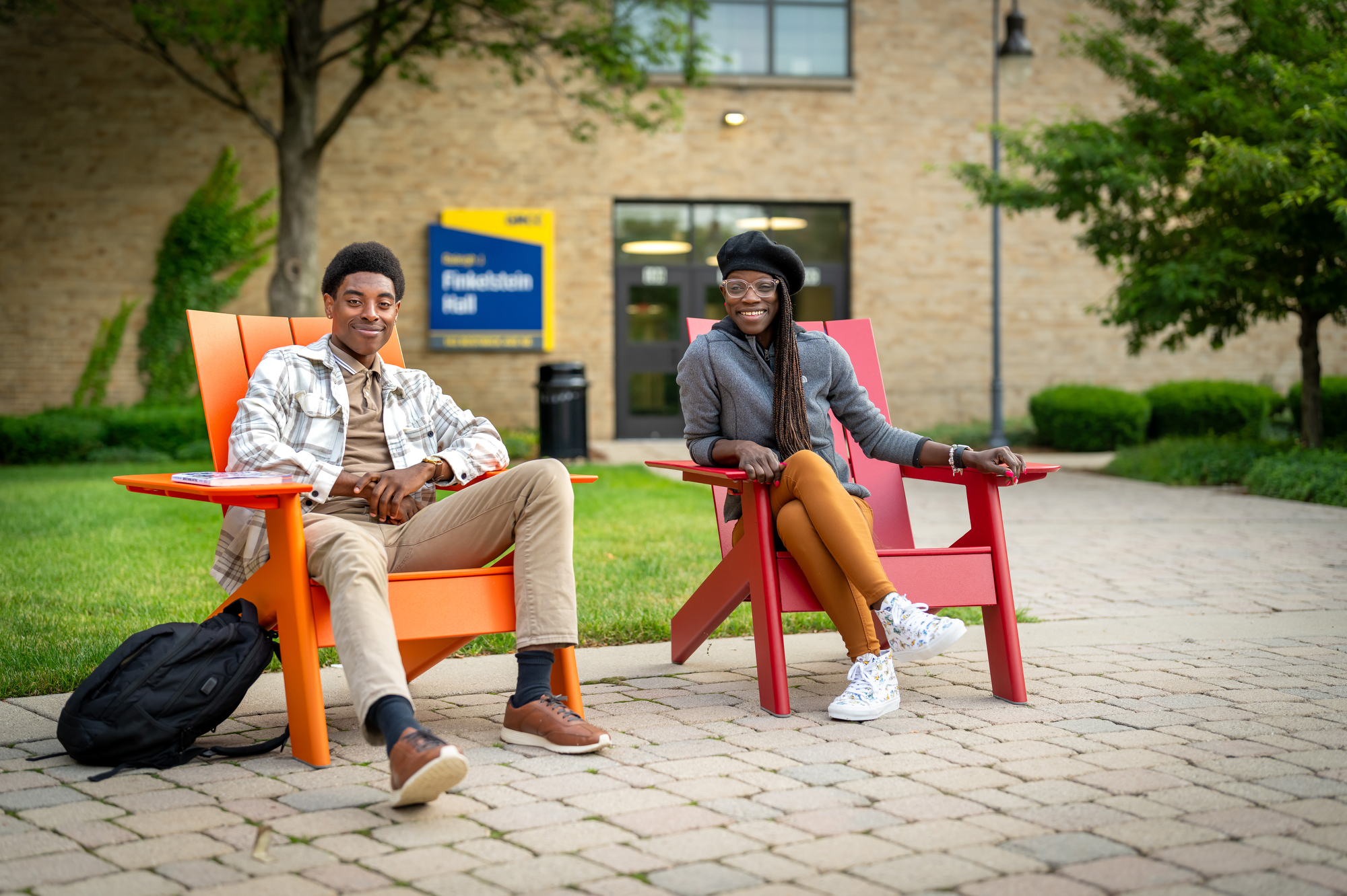 Two GRCC Students Sitting outside RFJ