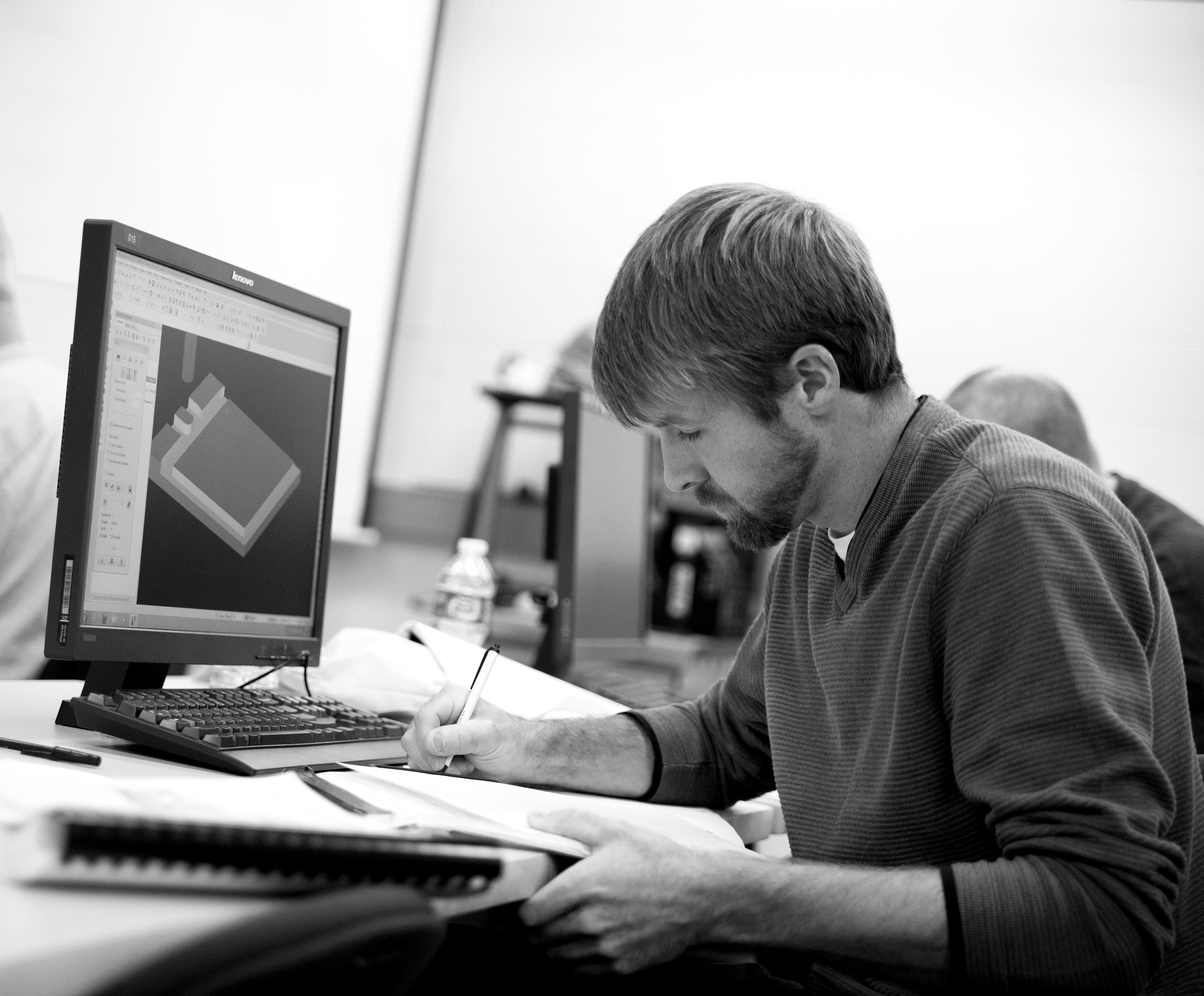 GRCC Student working a Computer Coding Project