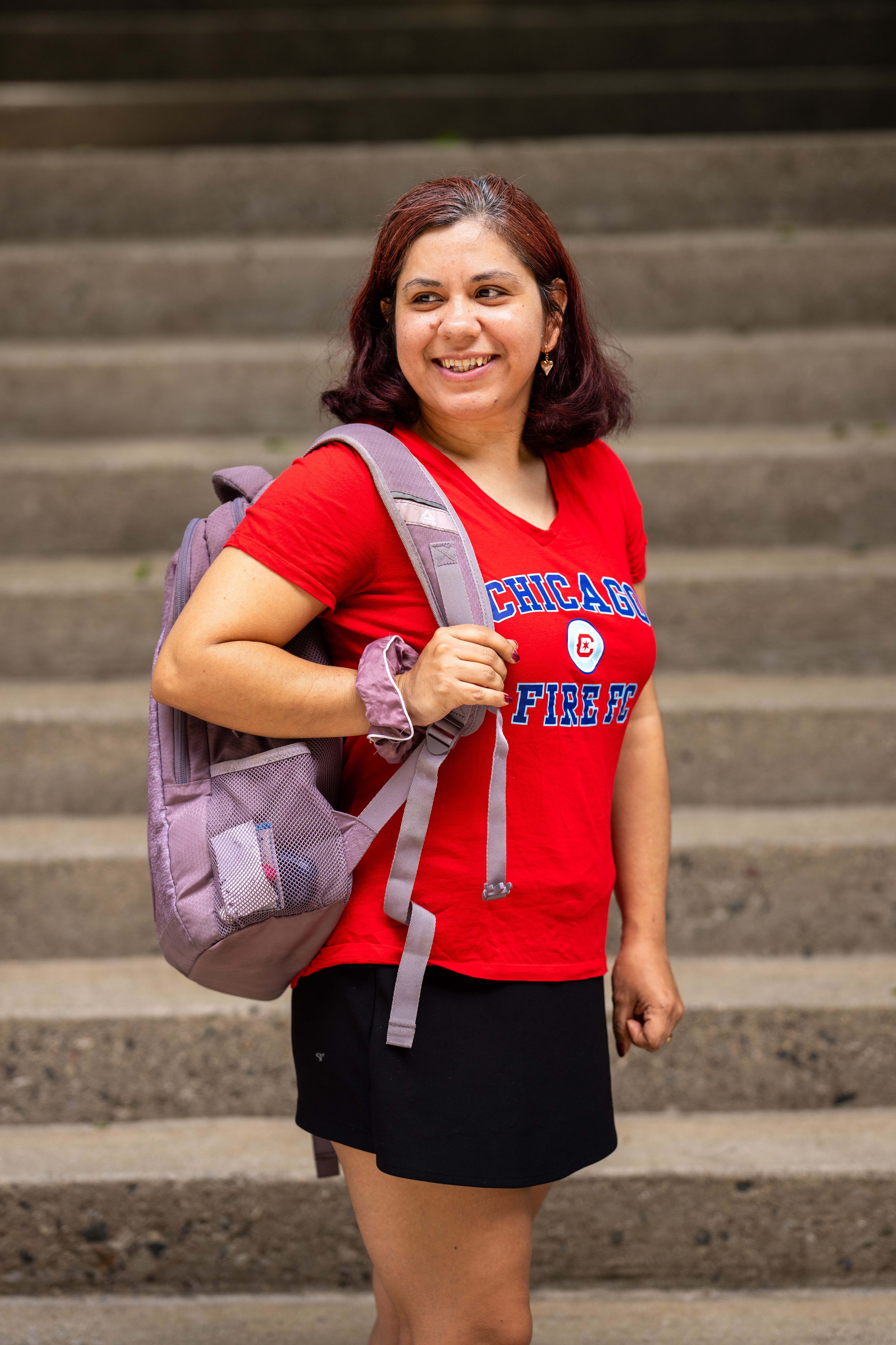 GRCC Student standing by Library Steps