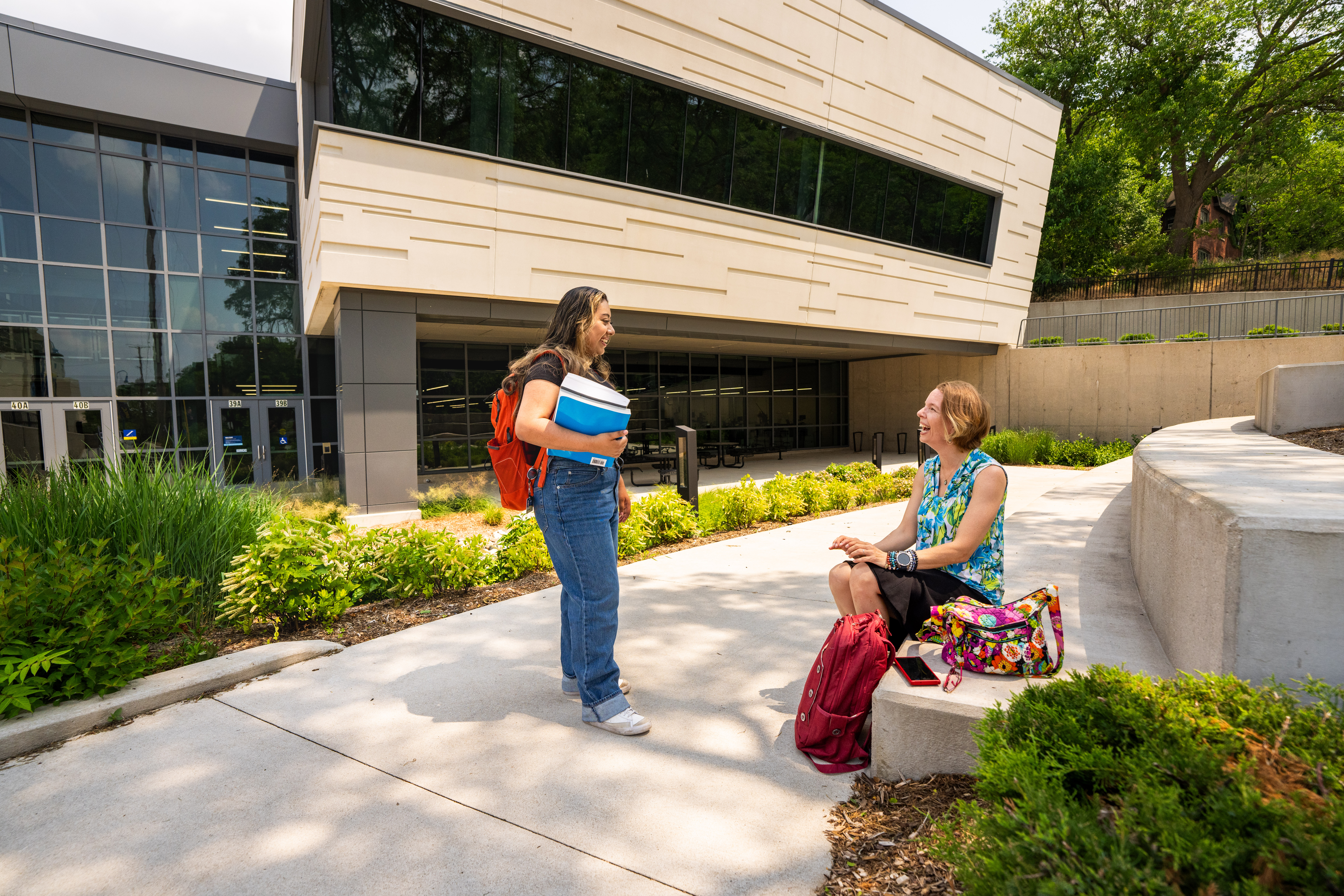 Two GRCC Students talking outside the Applied Technology Center